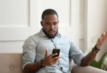 Random Photos Appearing On My Phone! Here’s Why & The Fix confused while using phone