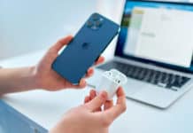 AirPod Case Not Charging? Fix All Related Issues airpods in their case next to iphone