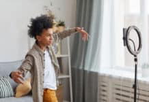 How To See Duets on TikTok A teenager filming a video