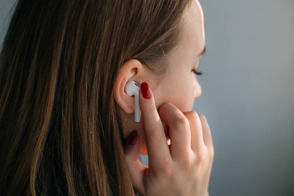 airpods connected in someones ear